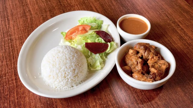 Pollo Guisado.